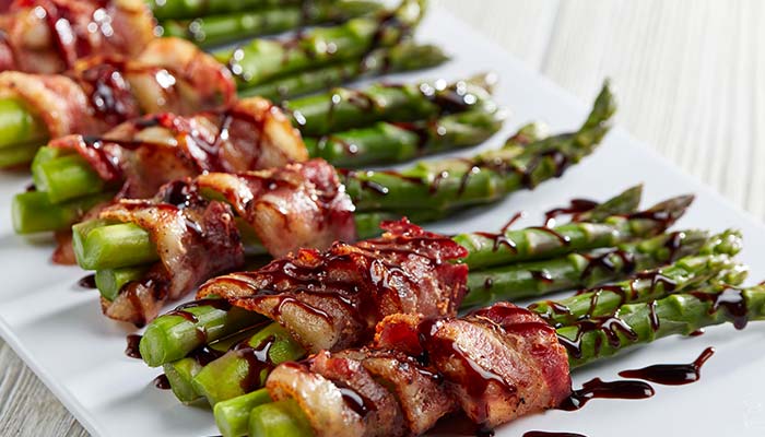 Bacon wrapped asparagus banquet and catering appetizer served at Waverly Beach Bar & Grille restaurant in the Fox Valley Menasha, WI